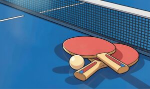 Two table tennis bats, laid flat on a table tennis table.